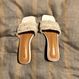 Brand new, never worn white slip on sandals